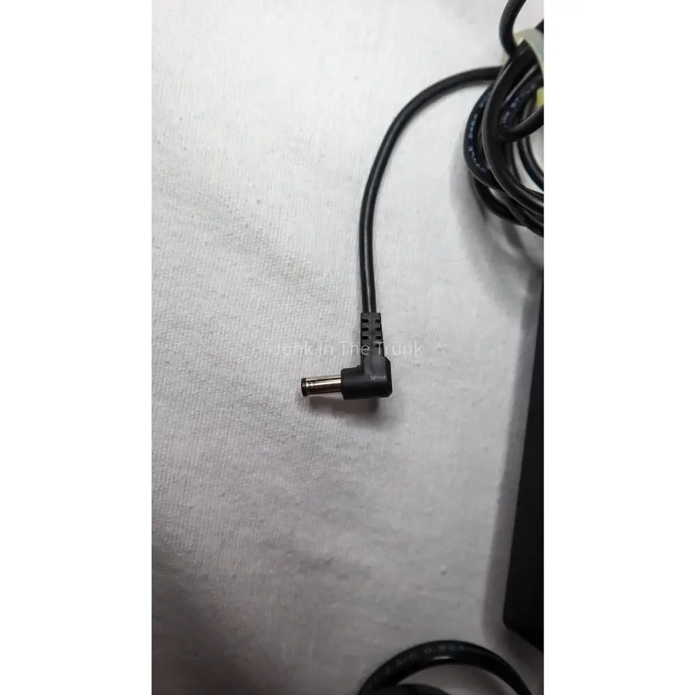 AC POWER ADAPTER Model: KS65DU-1500320